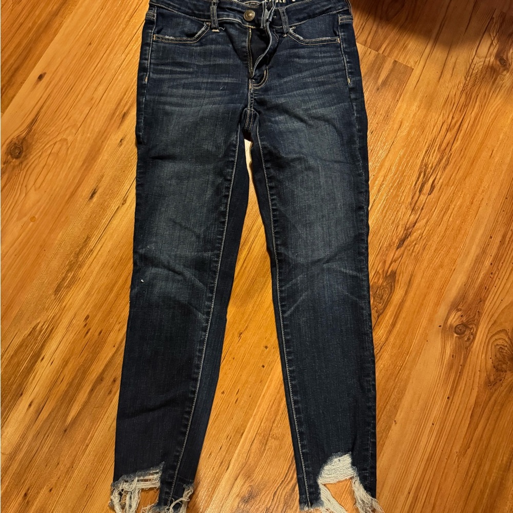 American Eagle Outfitters Dark Indigo Skinny Jeans with Distressed Hem